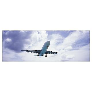 Wall Art  Posters  An airplane in flight, Maho