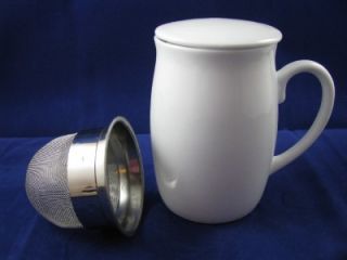 ew Konitz white porcelain perfect tea mug with lid and sieve. Mug is