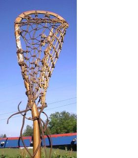 vintage wooden lacrosse stick. Measures 45 long. The lacrosse stick