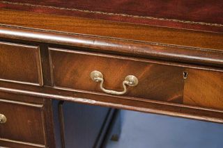 pulls adorn the drawer fronts; also note the wear marks to the drawer