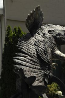 huge bronze eagle life size in full open wing flight mounted on bronze