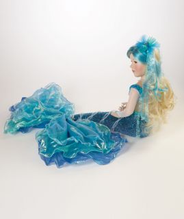 Marina Mermaid is simply stunning in her shimmery aquamarine mermaid