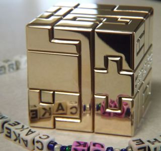 Mini Conundrum Metal 2 Puzzle Cube with Mirror Finish by GarE Maxton