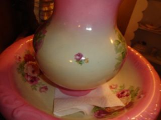 We are auctioning off this beautiful vintage porcelain wash bowl set