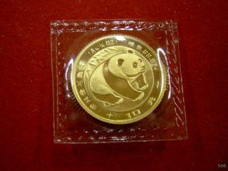 Sie erhalten eine 1/10 oz 10 Yuan Gold China Panda 1983 in