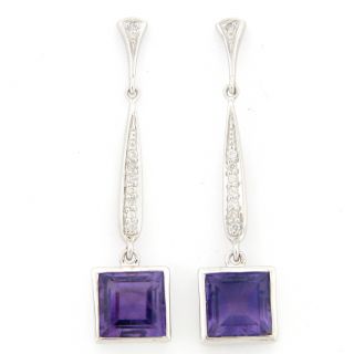 and 1/6ct TDW Diamond Earrings (H I, I2 I3) Today $105.79