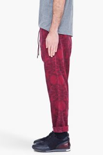 White Mountaineering Burgundy Ivy patterned Cropped Trousers for men